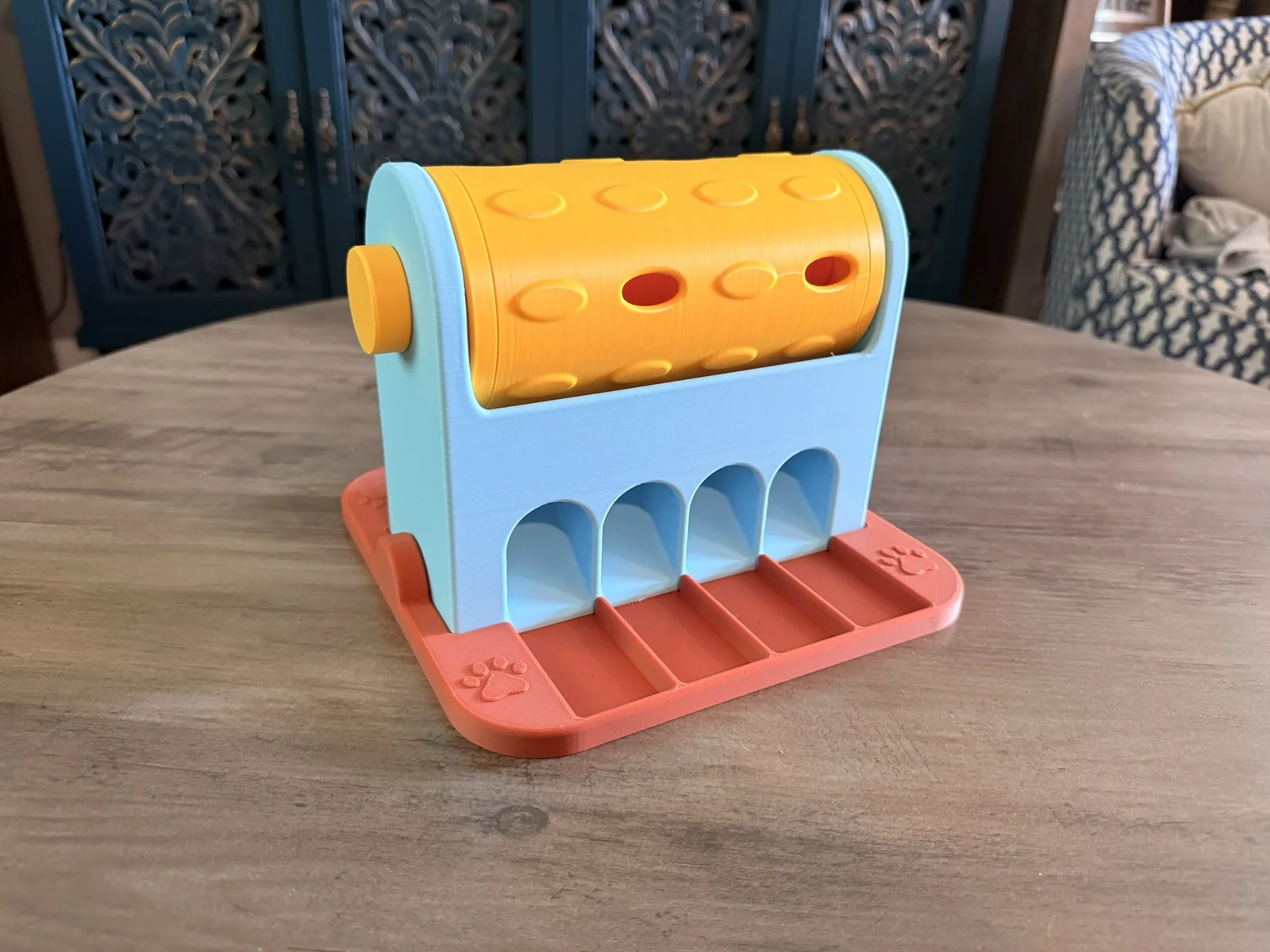 Anonymous custom print job example showing an assembled 3D printed spinning treat roller from a customer-provided model.